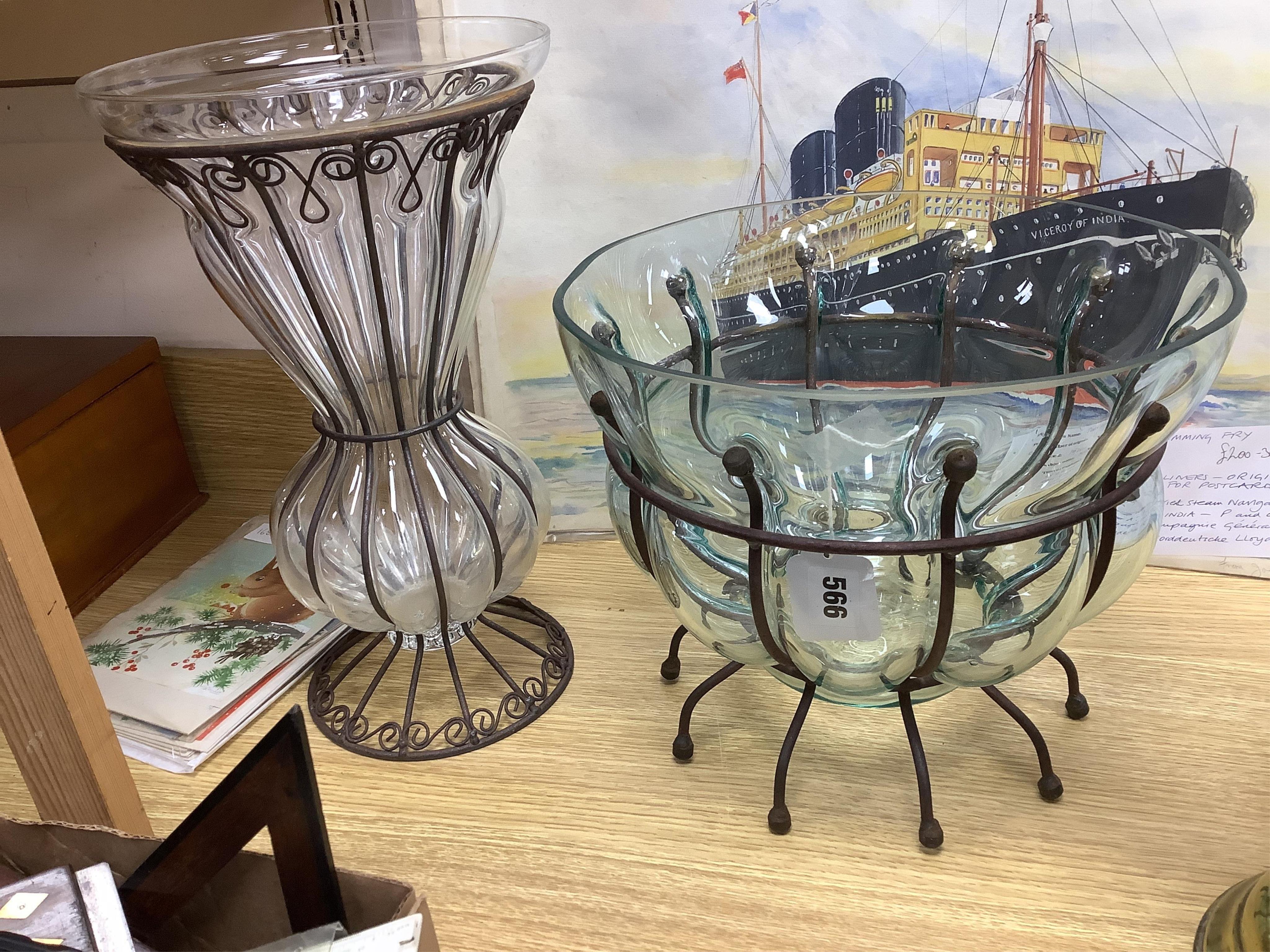 A glass vase and a similar bowl with wrought iron stand, vase 38cm high. Condition - good